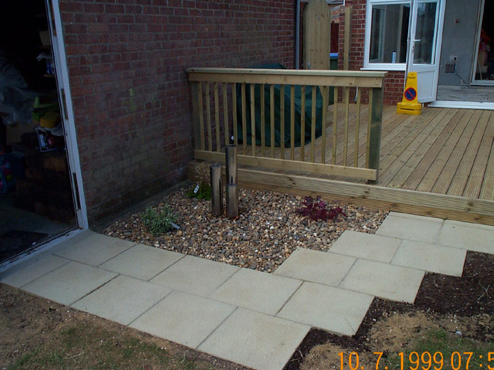 A new deck with timber balustrade and a small water feature to add intrest to a dull corner