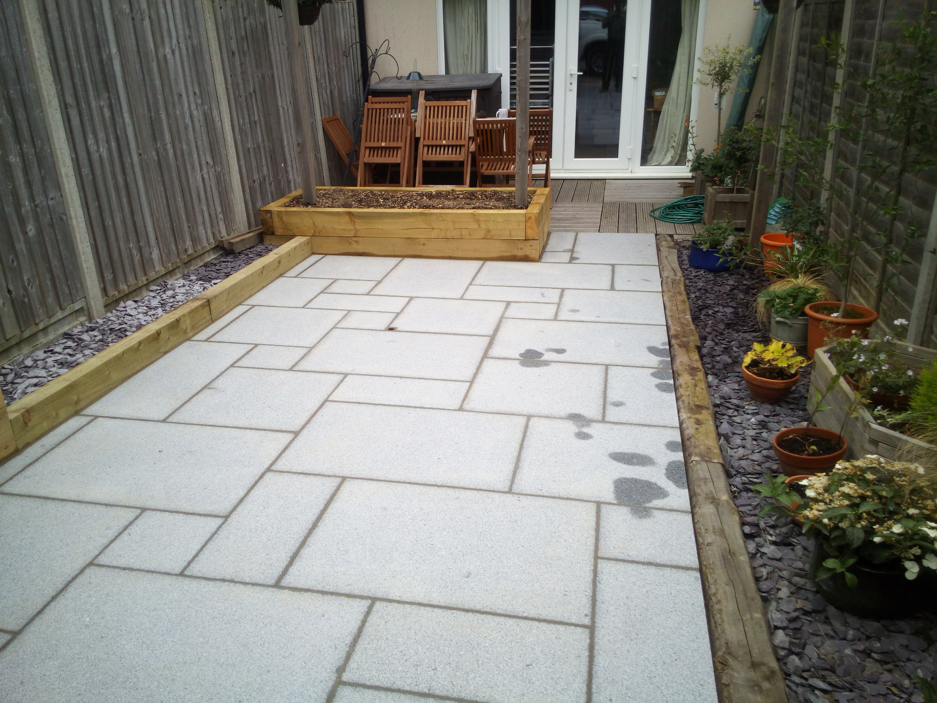 Small garden makeover with granite paving, sleepers, raised beds, Locks Heath